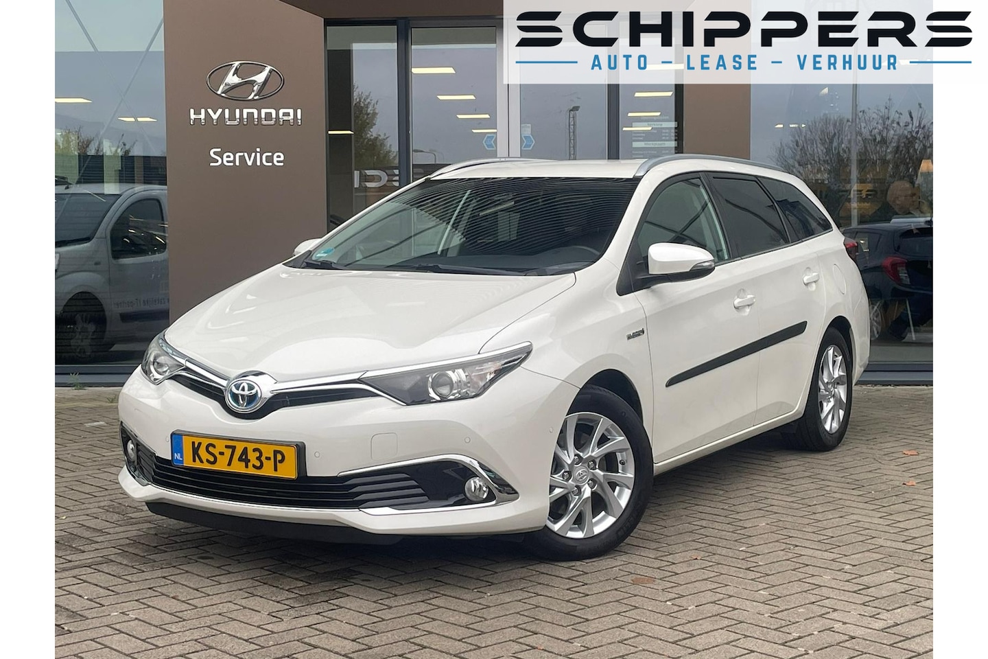 Toyota Auris Touring Sports - 1.8 Hybrid Executive | Trekhaak - AutoWereld.nl