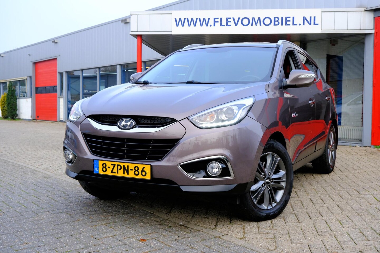 Hyundai ix35 - 1.6i GDI Go! Navi|1e Eig!|Half Leder|Cam - AutoWereld.nl