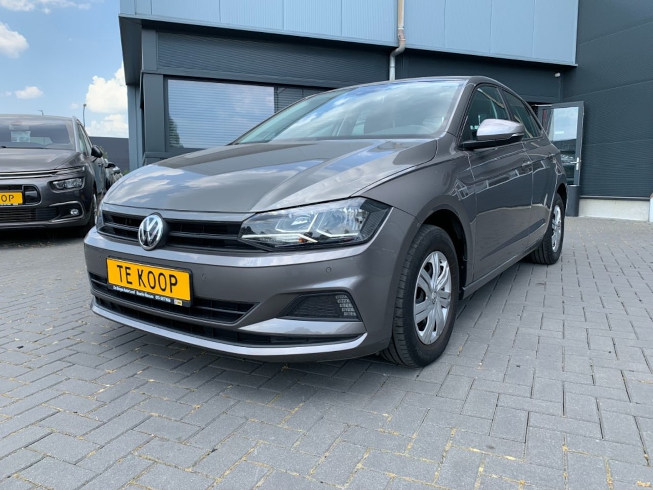 Volkswagen Polo - 1.0 MPi Comfortline Business Navigatie Trekhaak - AutoWereld.nl