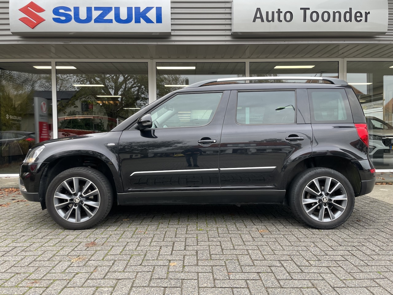 Skoda Yeti Outdoor - 1.2 TSI Greentech Edition 1.2 TSI Greentech Edition - AutoWereld.nl