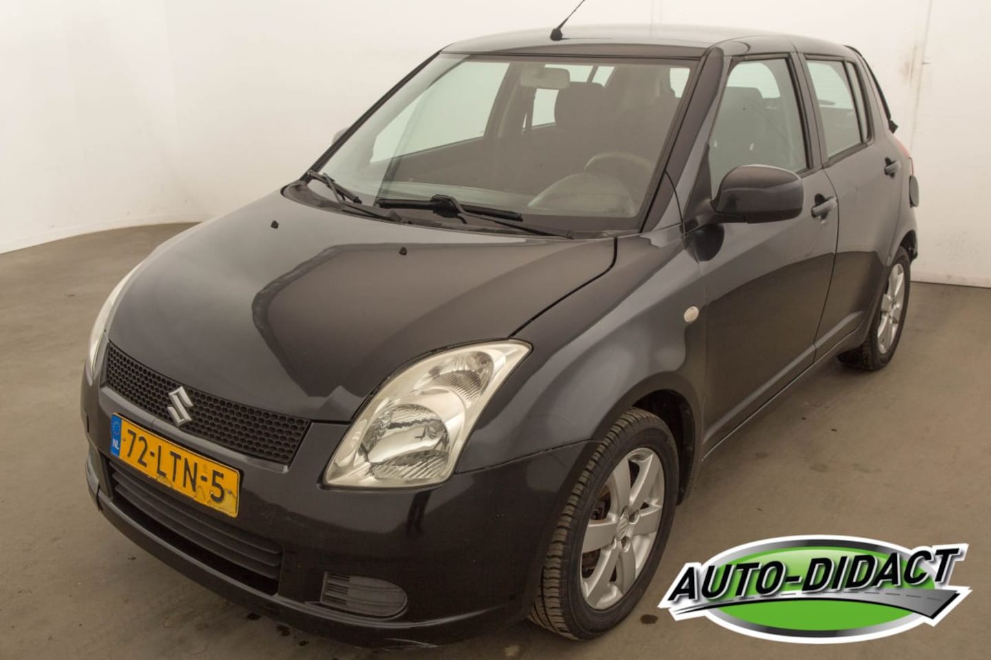 Suzuki Swift - 1.3 Airco Cool - AutoWereld.nl