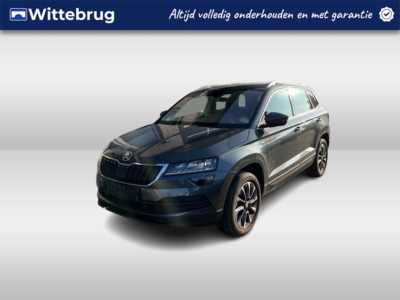 Skoda Karoq - 1.5 TSI Ambition Drive 125 / CAMERA/ PARK. SENSOREN/ LED/ CRUISE/ STOEL VERWARM. V EN A/ V - AutoWereld.nl