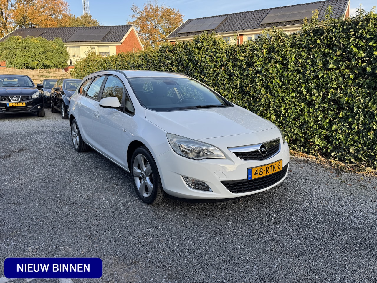 Opel Astra Sports Tourer - 1.4 Turbo Edition | Navi | Autom. Airco | Cruise Control | Trekhaak | LMV | PDC | APK tot - AutoWereld.nl