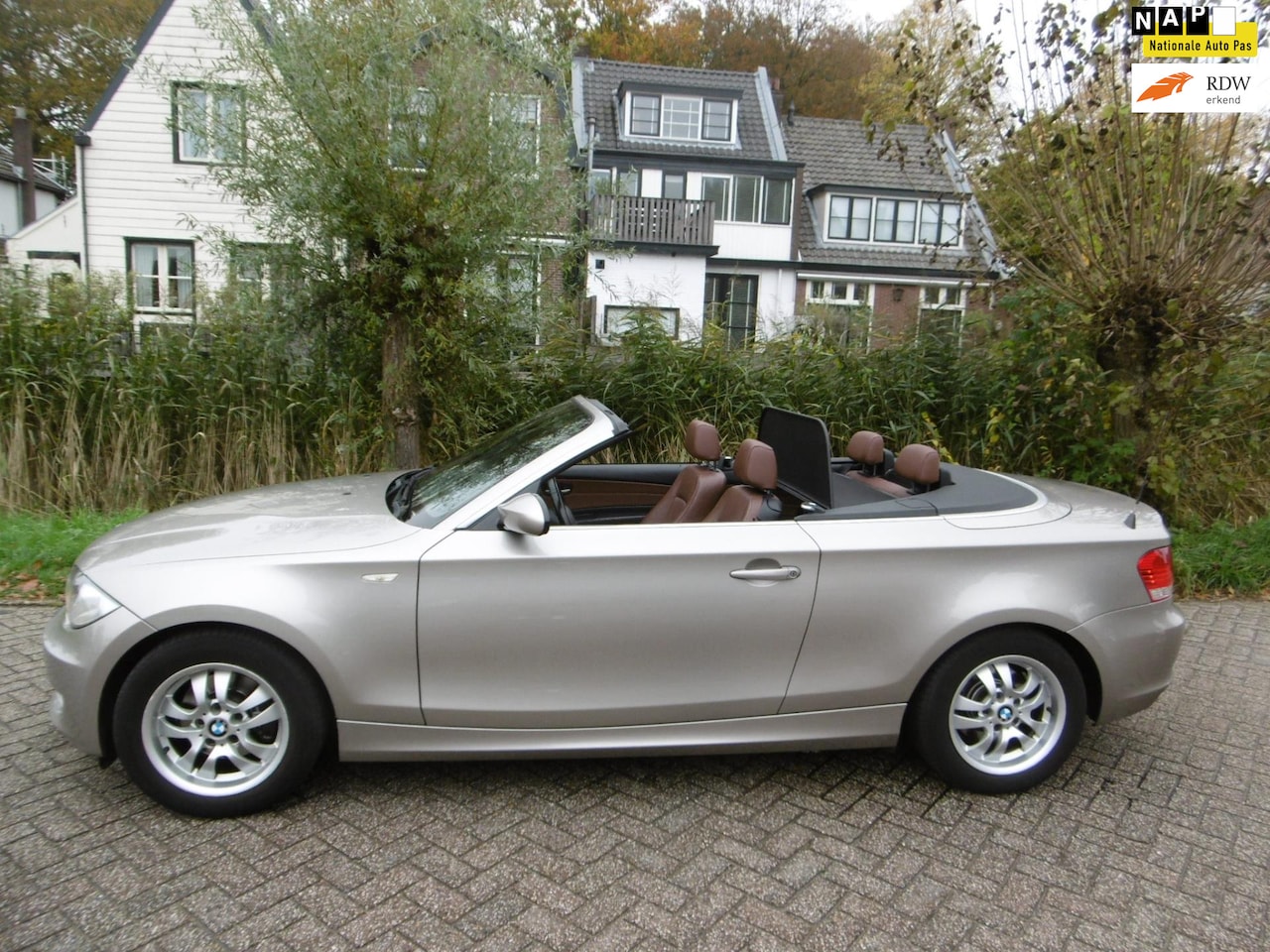 BMW 1-serie Cabrio - 120i High Exe 170pk Automaat Leder Clima Navi 146.000km NAP - AutoWereld.nl