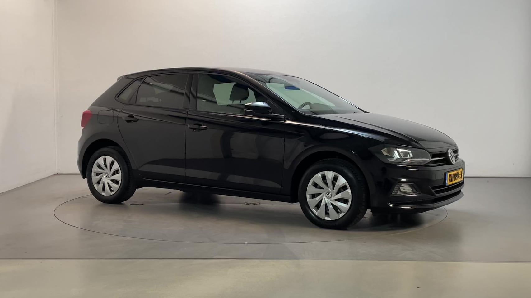 Volkswagen Polo - 1.0 TSI DSG Comfortline Leder-Stof Navigatie Parkeersensoren DAB+ - AutoWereld.nl