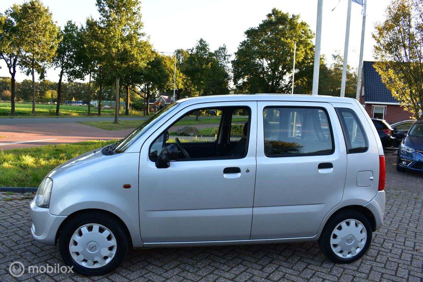 Opel Agila - 1.0 Temptation '05 Stuurbekrachtiging|Hoge instap - AutoWereld.nl