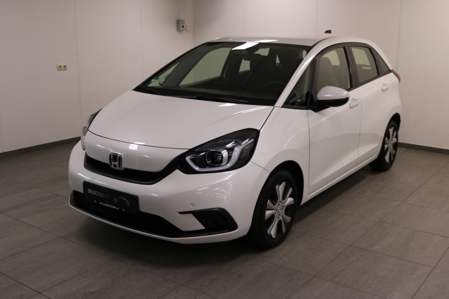 Honda Jazz - 1.5 e:HEV Elegance | Trekhaak | All-Weather banden - AutoWereld.nl