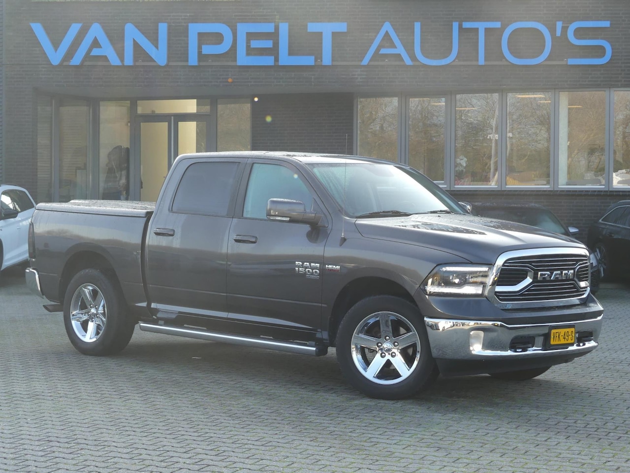 Dodge Ram 1500 - 5.7 V8 400PK HEMI Quad Cab 5Zits 6'4 LPG G3 - AutoWereld.nl