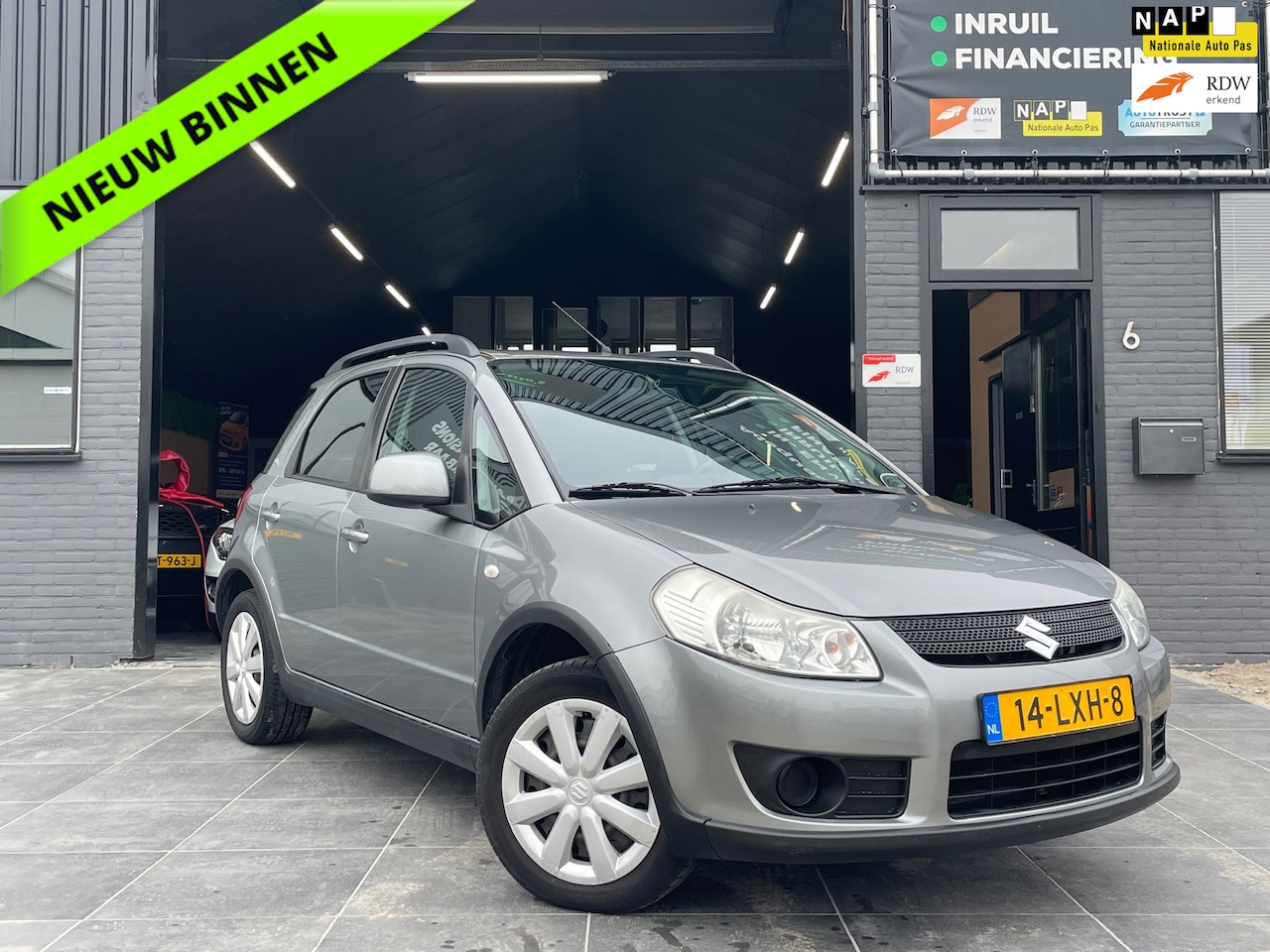 Suzuki SX4 - 1.5 Comfort|Airco|Elek. Ramen|APK|Trekhaak - AutoWereld.nl