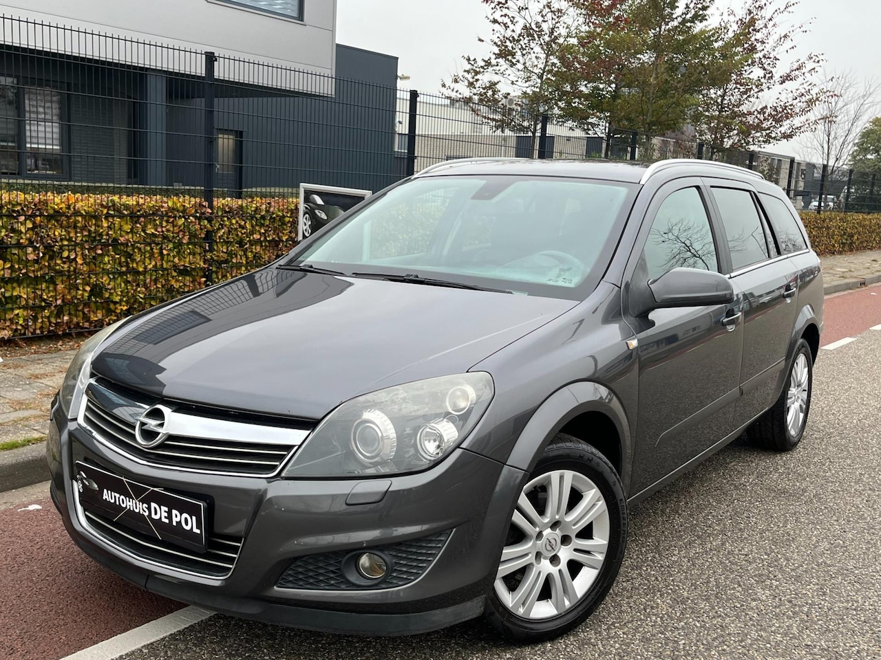 Opel Astra Wagon - 1.4 111 Cosmo Cruise/Climate-control Trekhaak - AutoWereld.nl