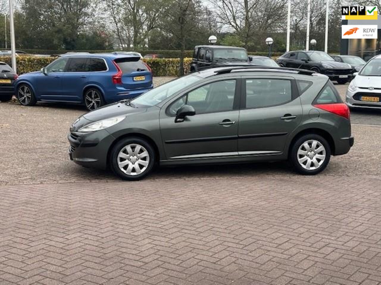 Peugeot 207 SW - 1.4 VTi X-line 1.4 VTi X-line,bj.2008,kleur:grijs,airco,APK tot 10/2025 en NAP met 187373 km.stereo,zeer - AutoWereld.nl