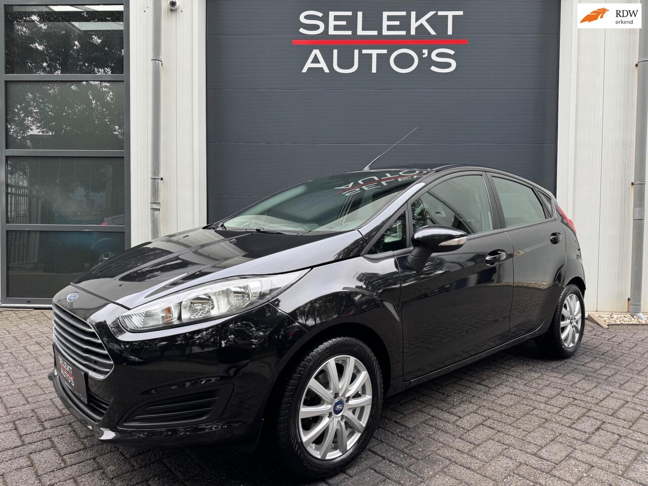 Ford Fiesta - 1.25 Titanium 82 Pk Airco/Stoelverwarming/AUX/5-Deurs/Elekt Ramen/Elekt Spiegels/USB/15 In - AutoWereld.nl