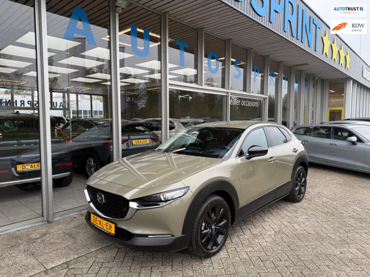 Mazda CX-30 - 2.0 e-SkyActiv-G M Hybrid Homura 150PK / ELEKTRISCHE ACHTERKLEP / NAVIGATIE / ACHTERUITRIJ - AutoWereld.nl