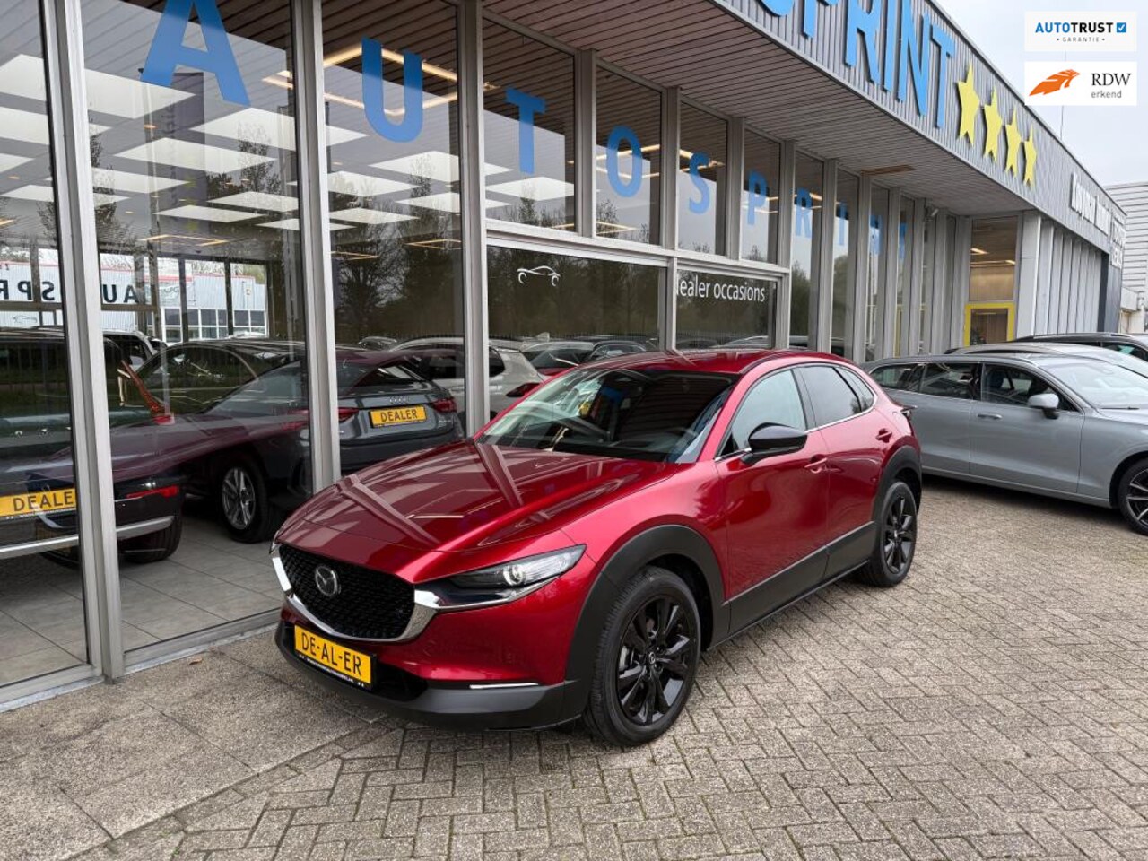 Mazda CX-30 - 2.0 e-SkyActiv-G M Hybrid Homura 150PK / ELEKTRISCHE ACHTERKLEP / NAVIGATIE / ACHTERUITRIJ - AutoWereld.nl