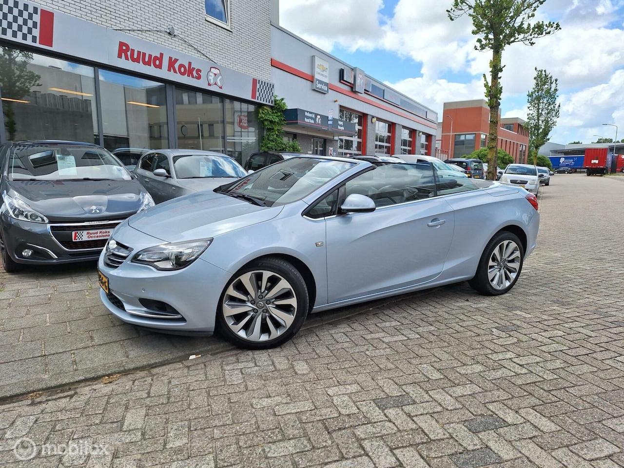 Opel Cascada - 1.6 TURBO COSMO CABRIO / NL Auto / 200pk / Navigatie / Stoelverwarming / Achteruitrijcamer - AutoWereld.nl