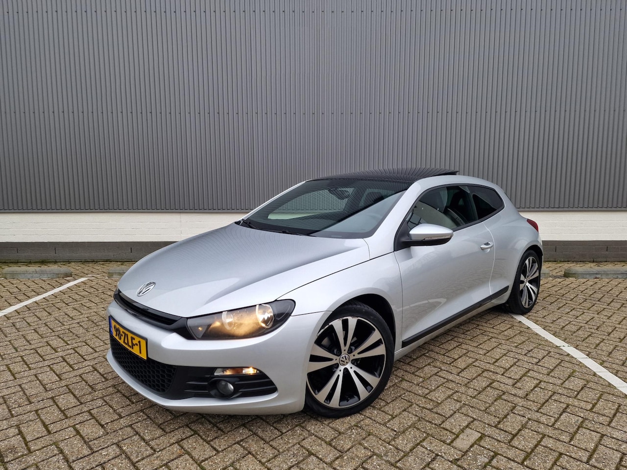 Volkswagen Scirocco - 1.4 TSI Edition Panodak Leder Airco Ecc Navi PDC MFS - AutoWereld.nl