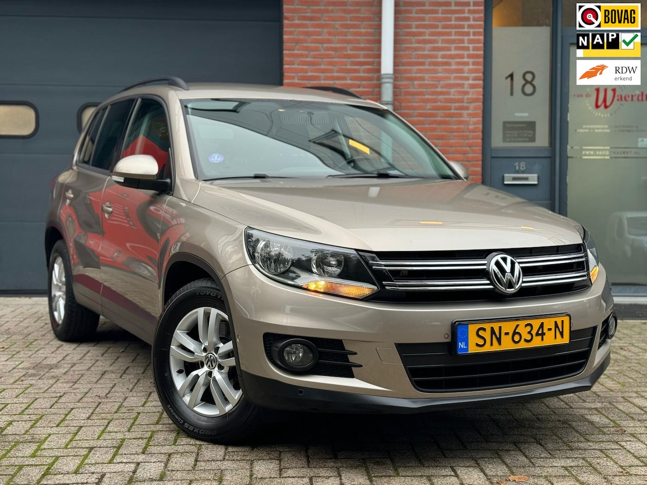 Volkswagen Tiguan - 1.4 TSI Sport&Style|Elek.Pakket|APK|LM Velgen|Onderhouden|BOVAG ERKEND|TREKHAAK - AutoWereld.nl