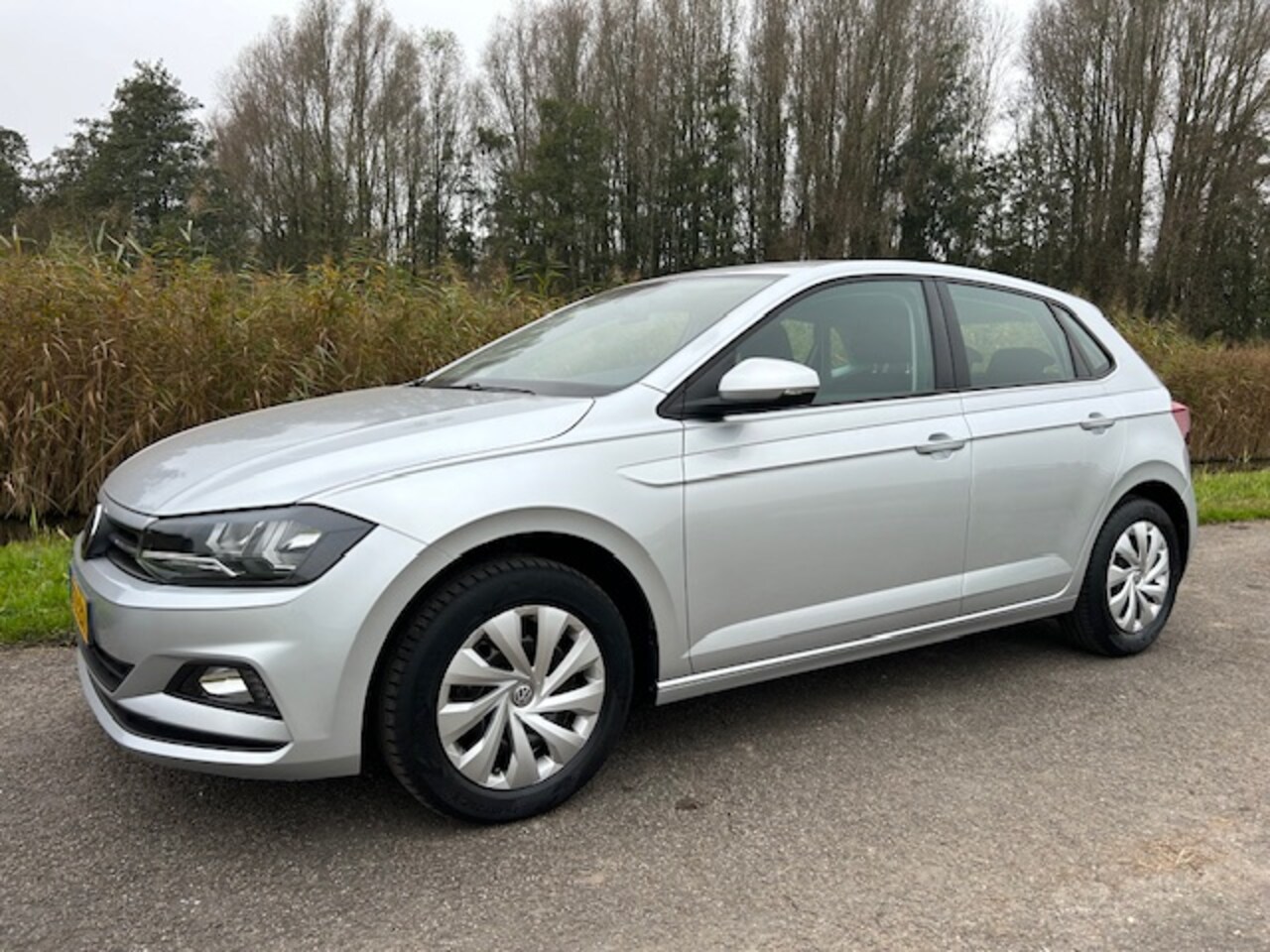 Volkswagen Polo - 1.0 MPI 80pk Comfortline | Navigatie | Apple carplay / Android auto | Airco | Cruise contr - AutoWereld.nl