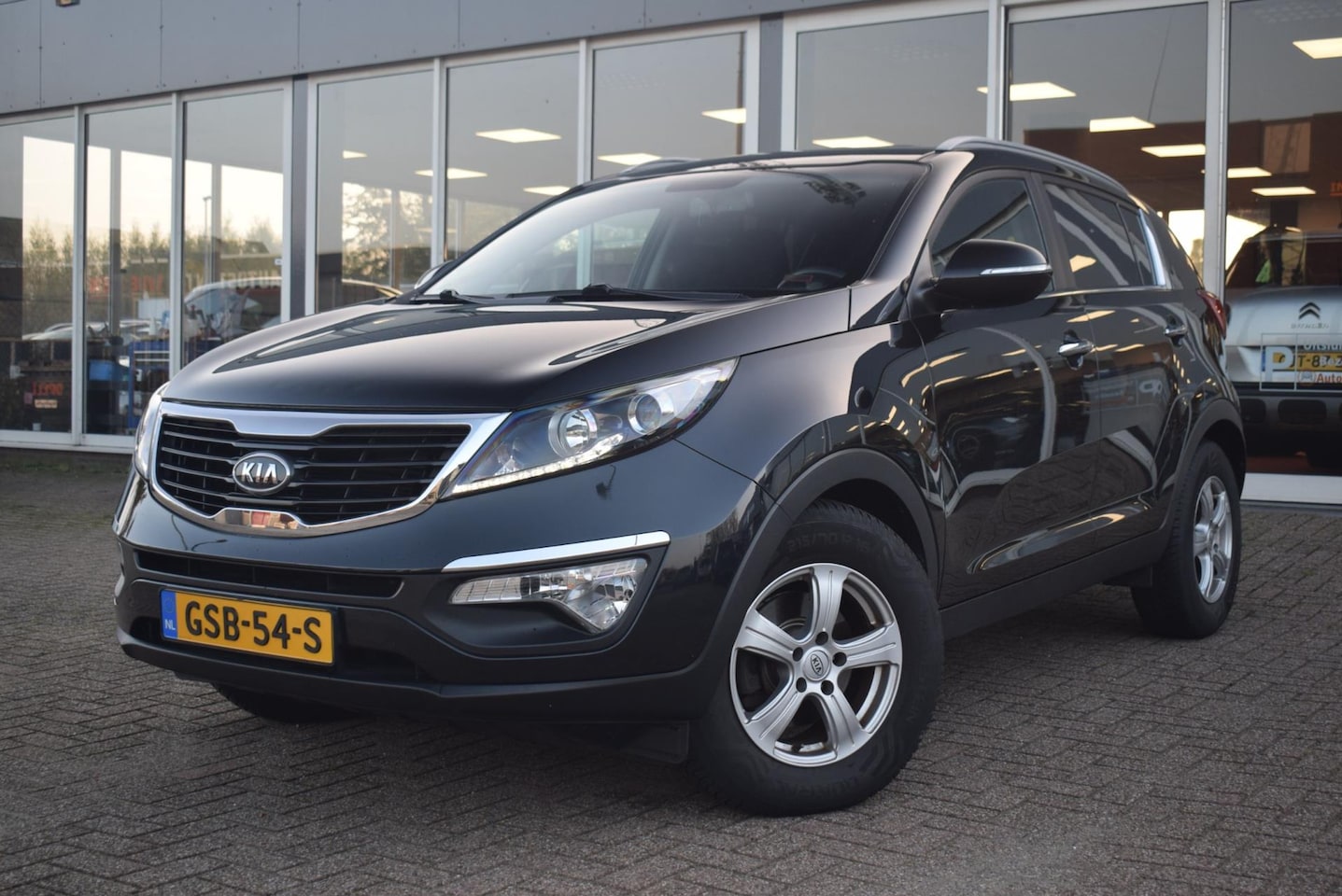 Kia Sportage - BI-XENON | 2.0 X-ecutive | AIRCO |STOELVERWARMING | CRUISECONTROL | ACHTERUITRIJCAMERA | A - AutoWereld.nl