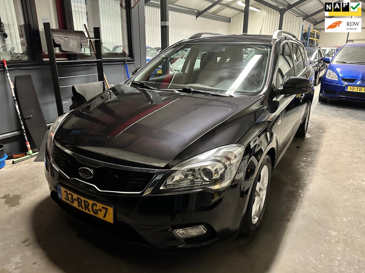 Kia Cee'd Sporty Wagon - 1.4 CVVT Navigator Plus Pack 1.4 CVVT Navigator Plus Pack - AutoWereld.nl