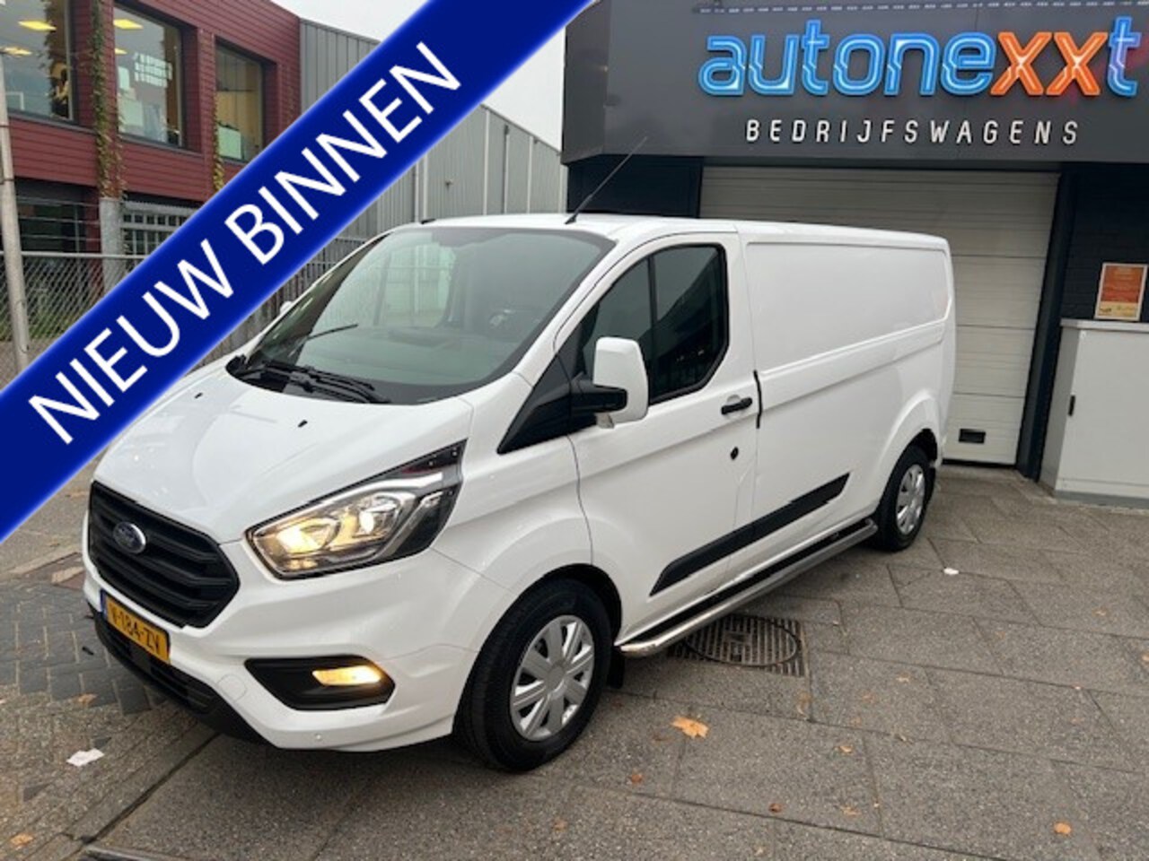 Ford Transit Custom - 300 2.0 TDCI L2H1 Trend AIRCO I NAVI I PDC I AUTOMAAT I 1e EIGENAAR I COMPLETE ONDERHOUDSH - AutoWereld.nl