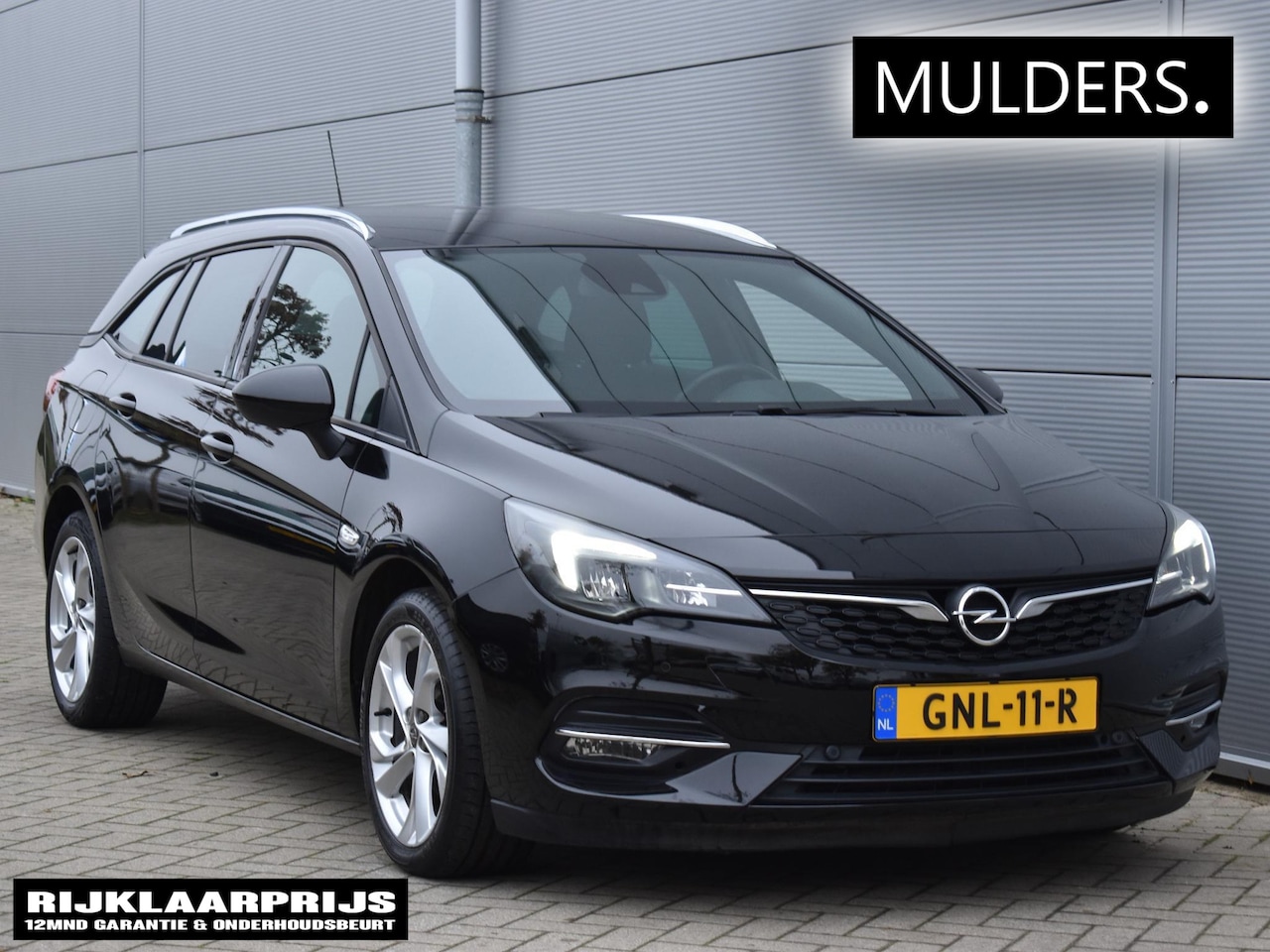 Opel Astra Sports Tourer - 1.2 Elegance | Navi / Climate / Cruise - AutoWereld.nl