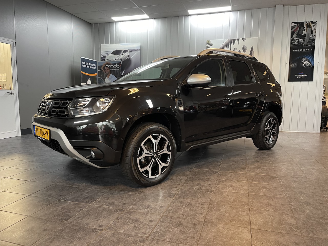 Dacia Duster - 1.2 TCe Prestige Climate control, Lederen bekleding, Cruise control. - AutoWereld.nl