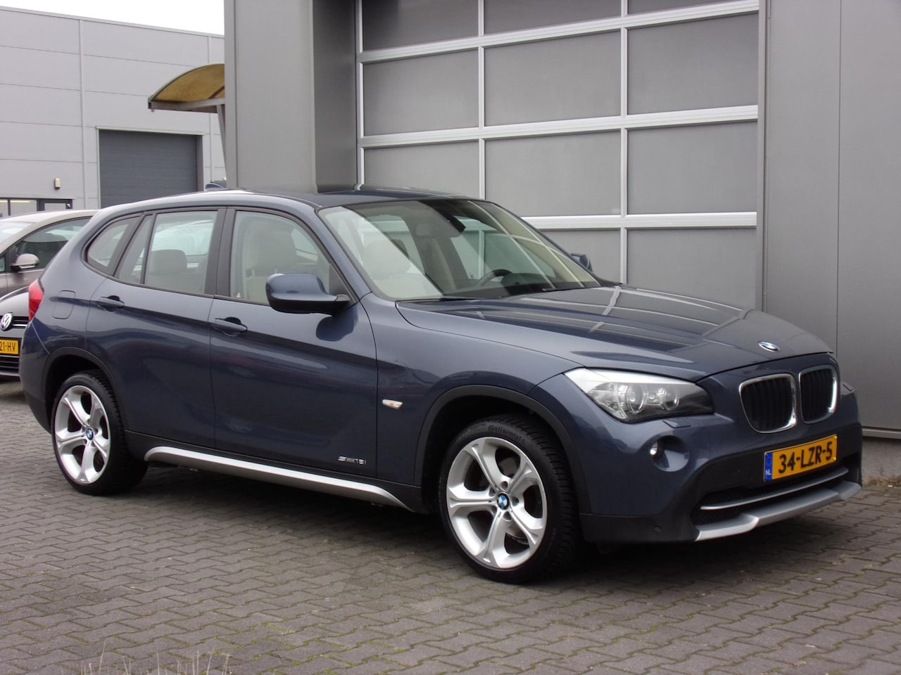 BMW X1 - SDrive18i Executive Panodak/Clima/Navi/Cruise!! - AutoWereld.nl