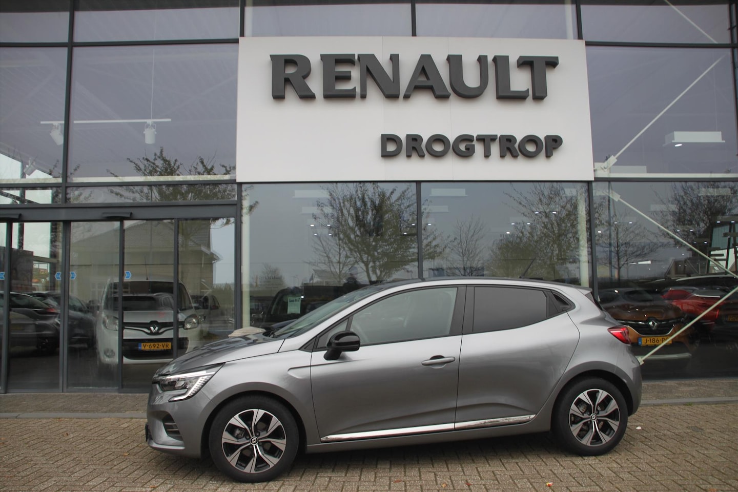 Renault Clio - 90PK-EVOLUTION-29DKM-NAVI-AIRCO-CRUISE-LMV- - AutoWereld.nl