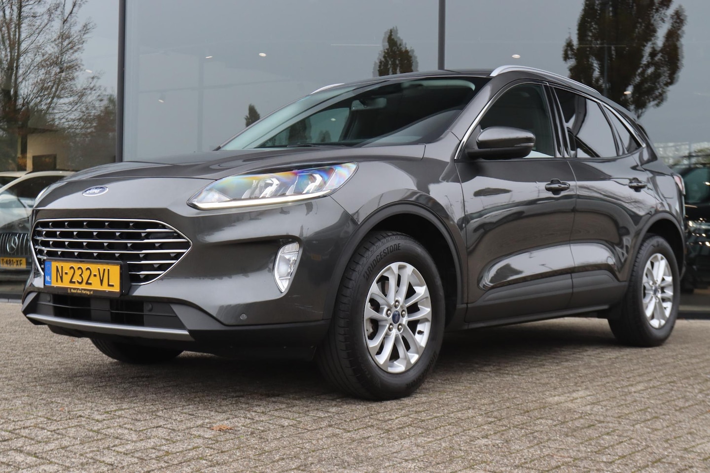 Ford Kuga - 1.5 ECOBOOST TITANIUM | ELEKT. TREKHAAK | PRIVACY | WINTERPACK | CARPLAY | KEY-LESS| CAMER - AutoWereld.nl