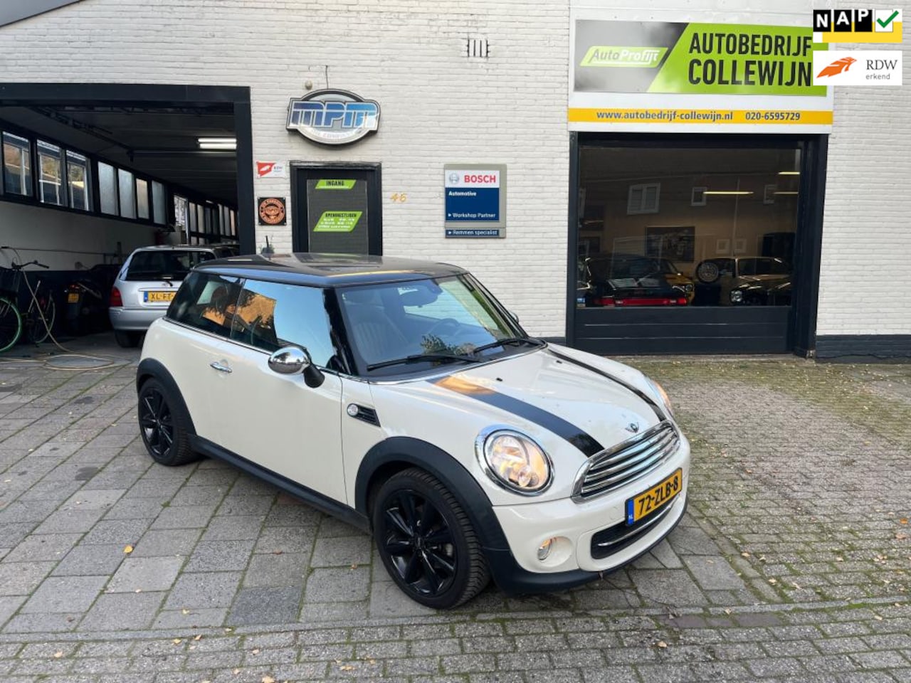 MINI Cooper - Mini 1.6 Westminster Navigatie/leer/nw motor - AutoWereld.nl