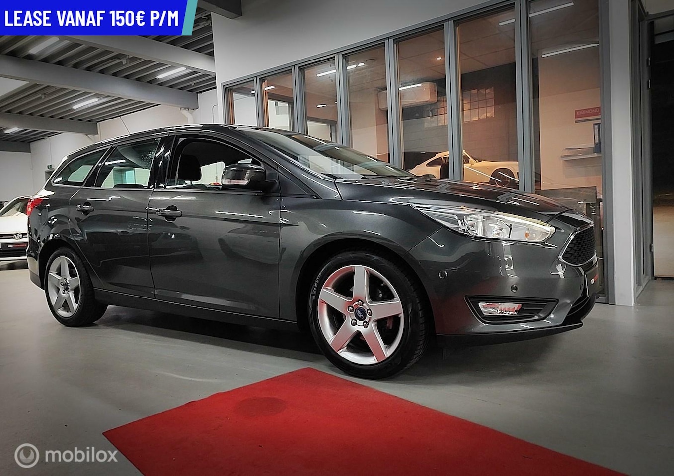 Ford Focus Wagon - 1.0 turbo PDC NAVI TREKHAAK NIEUWE DISTRIBUTIERIEM CLIMA - AutoWereld.nl