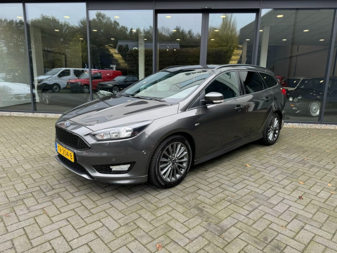 Ford Focus Wagon - 1.0 ST-Line Wagon 1.0 ST-Line,Winterpack,Carplay,Navi,Clima,Cruise,PDC,Trekh - AutoWereld.nl