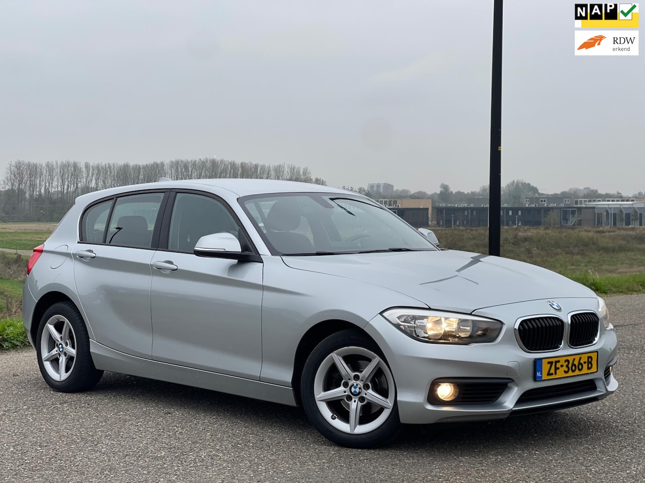 BMW 1-serie - 118i Sport 1e Eignr|Automaat|Navi|Airco|Lmv|Nap|Boekjes - AutoWereld.nl