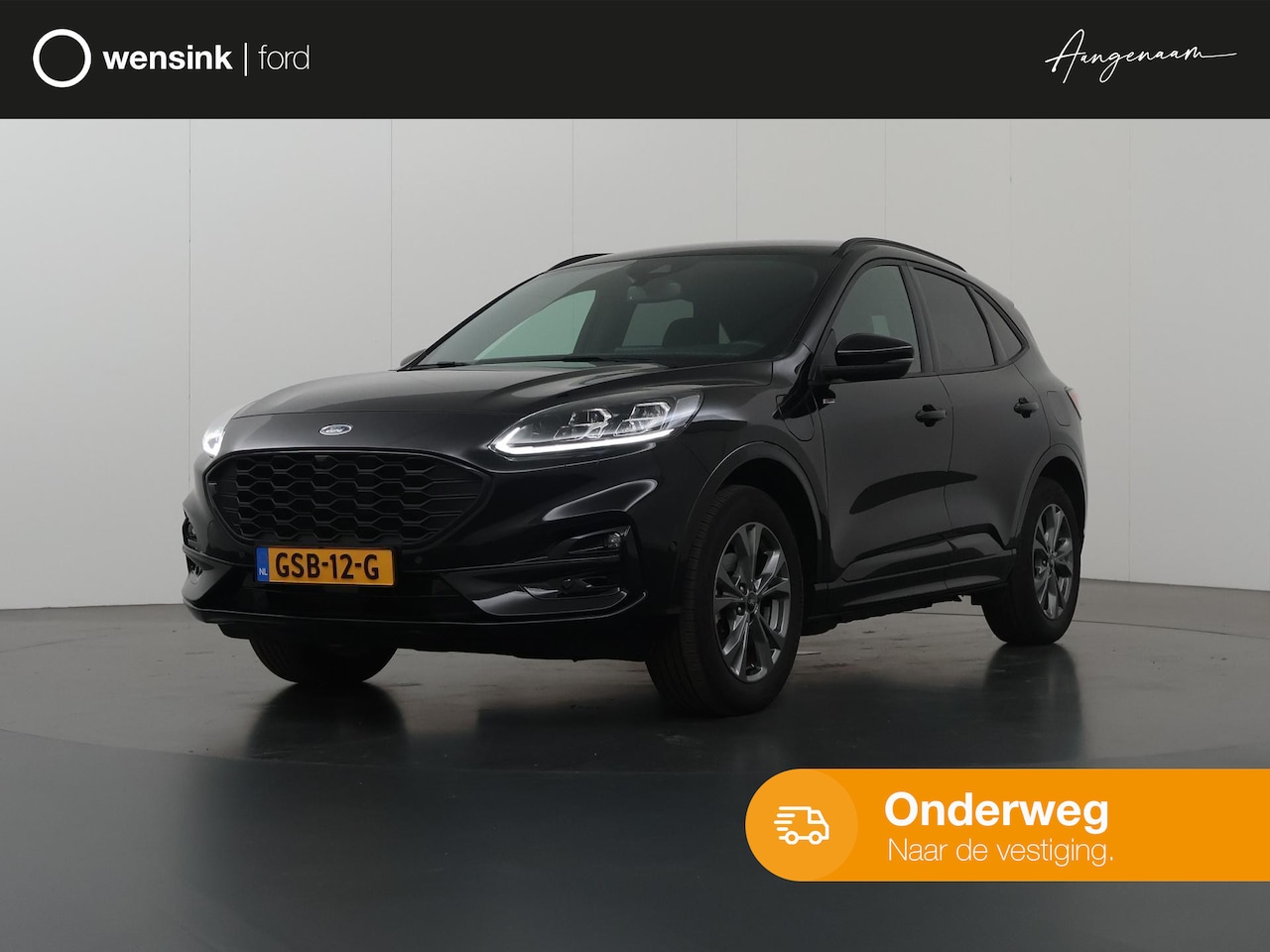 Ford Kuga - 2.5 PHEV ST-Line X | Adaptive Cruise Control | Stoelverwarming | Climate Control | Parkeer - AutoWereld.nl