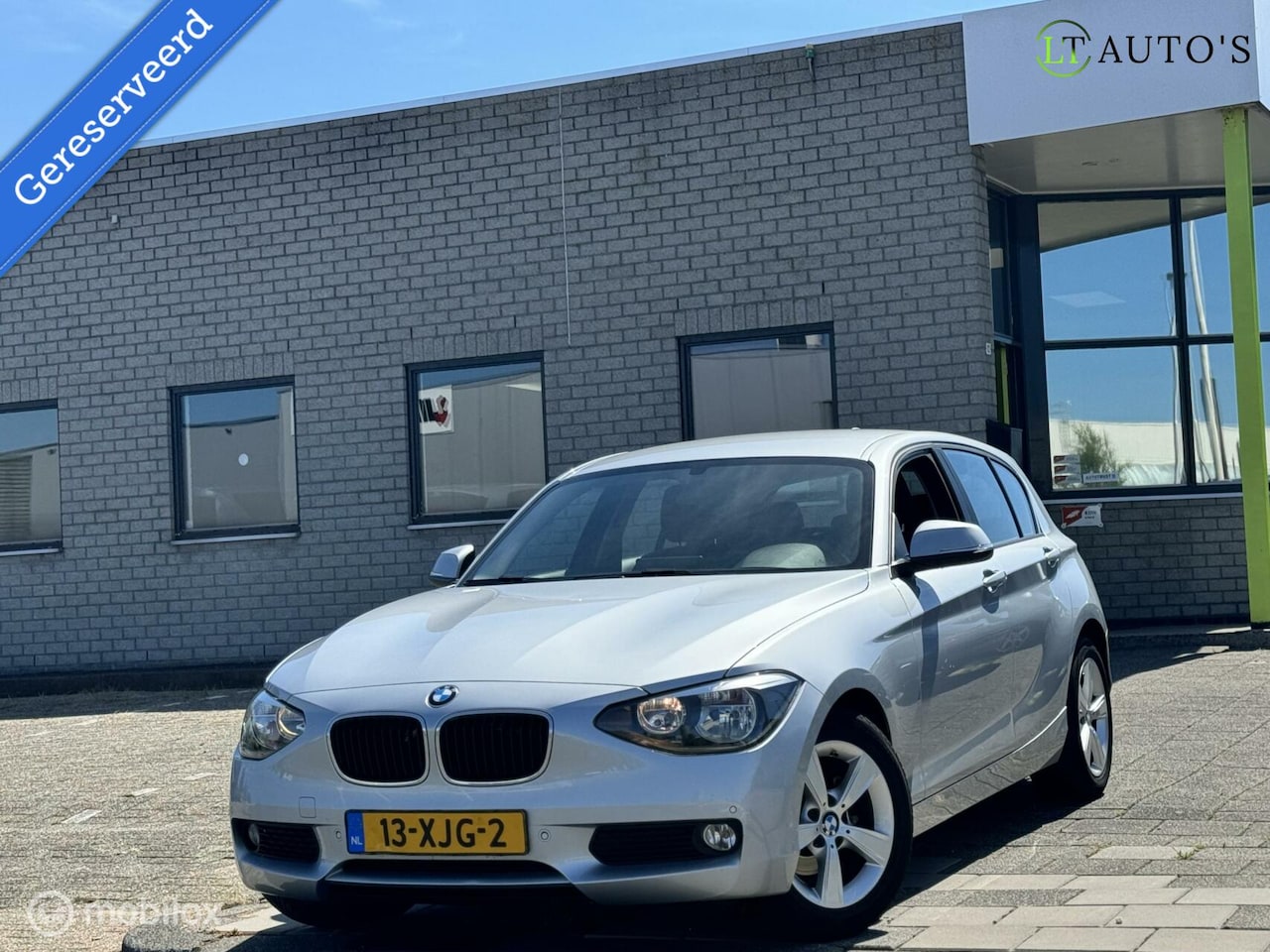 BMW 1-serie - 116i Business+|Automaat Carplay Airco Cruise NAP - AutoWereld.nl