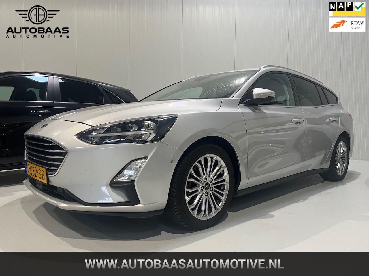 Ford Focus Wagon - 1.0 EcoBoost Titanium AUTOMAAT+NL-AUTO+NAP+1EIG+NAVI+KEYLESS+STOELVERWARMING+TREKHAAK+B&O - AutoWereld.nl