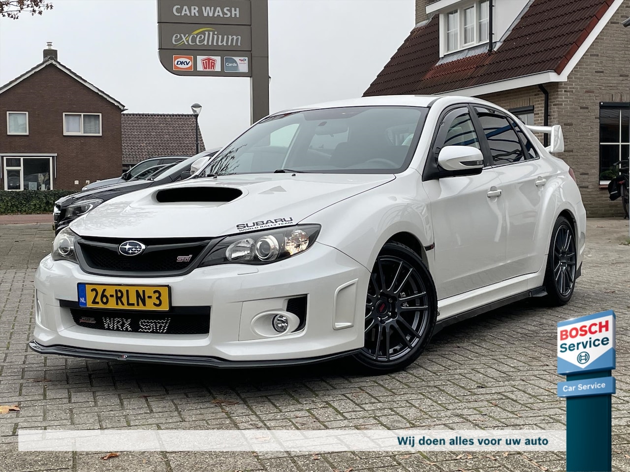 Subaru WRX STI - 2.5 350PK T Sport 4x4 / Org Nl / Navi / Keyless / Schaalstoelen / Cruise / Clima / Maxton - AutoWereld.nl