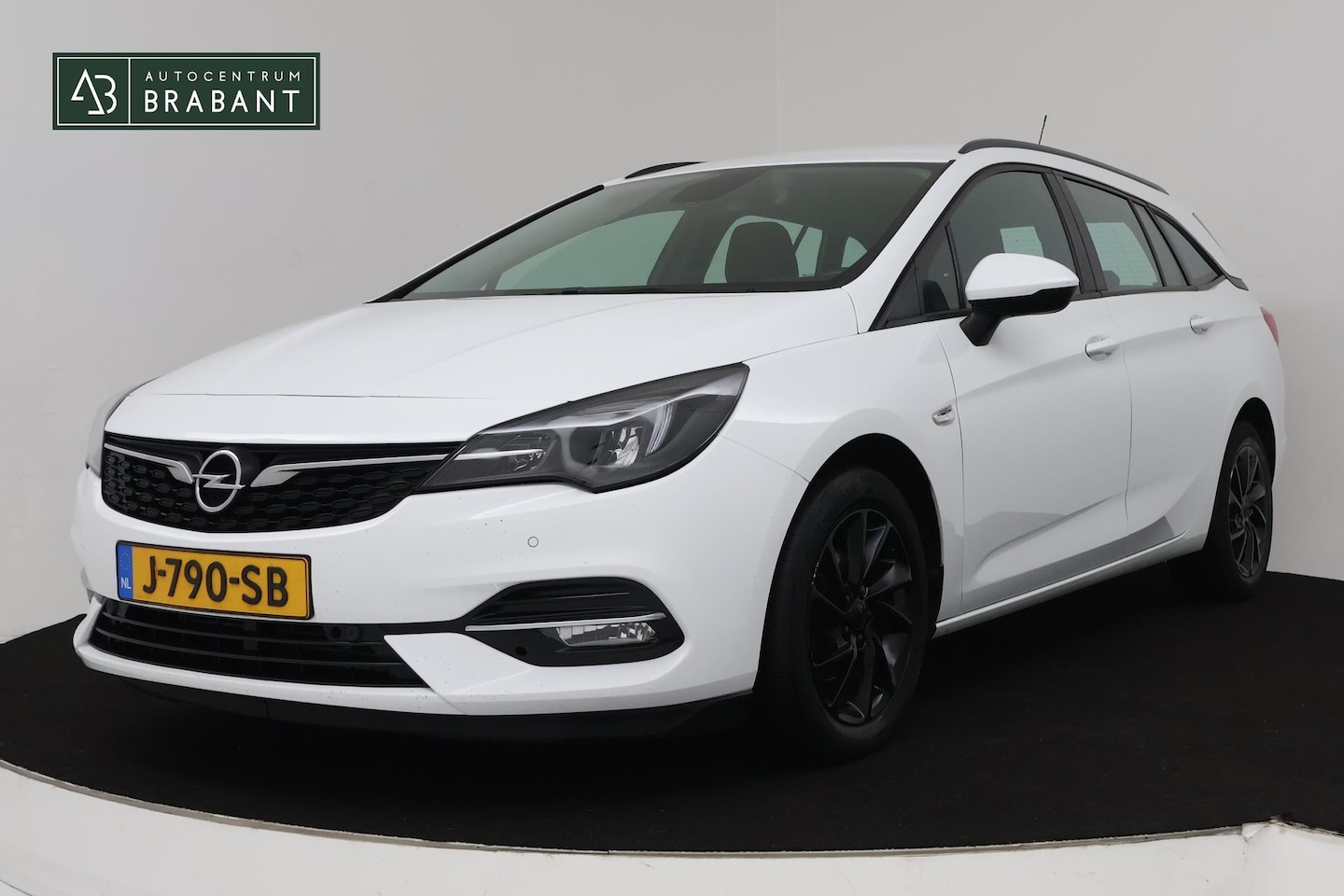 Opel Astra Sports Tourer - 1.4 Edition Automaat (CAMERA, CLIMATE, CRUISE CONTROL, NAVIGATIE, NL-AUTO, GOED ONDERHOUDE - AutoWereld.nl