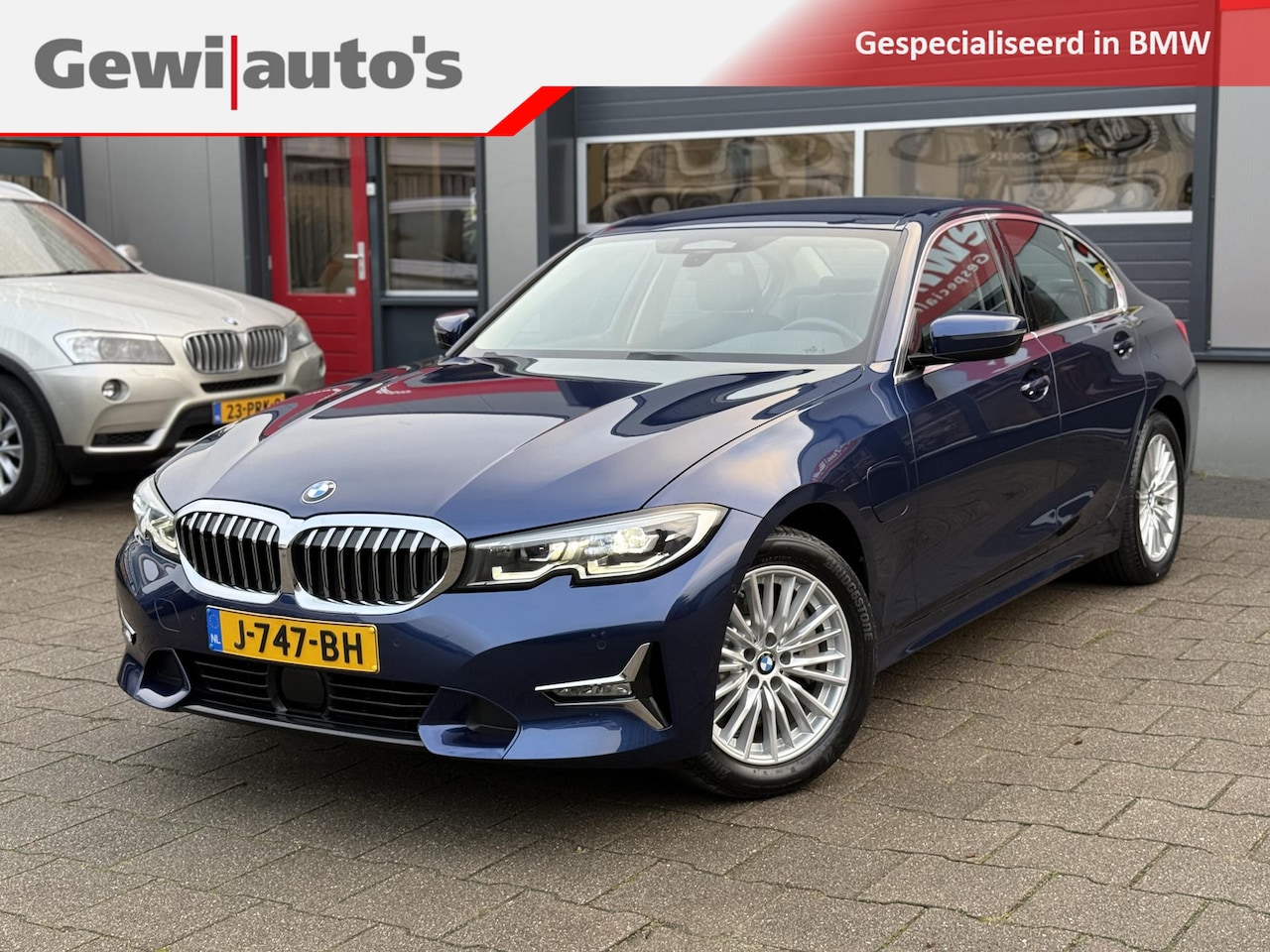 BMW 3-serie - 330e High Executive Luxury Line - AutoWereld.nl