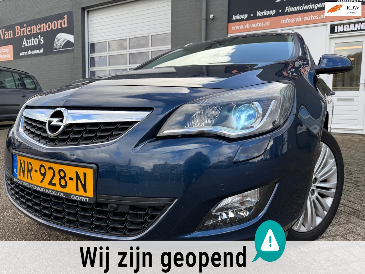 Opel Astra Sports Tourer - 1.4 Turbo Sport met parkeersensoren en navigatie en airco - AutoWereld.nl