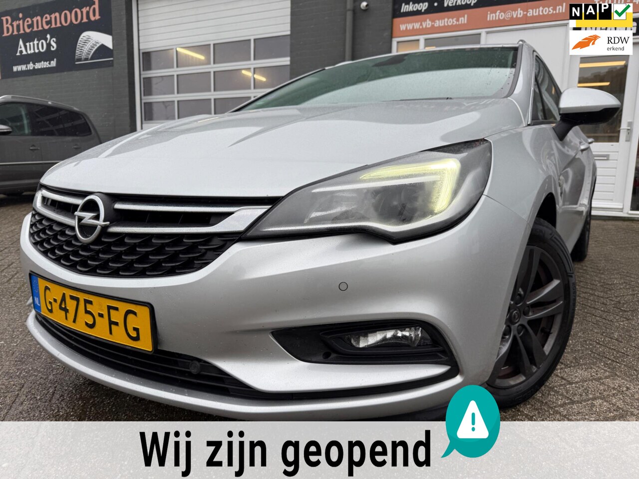 Opel Astra Sports Tourer - 1.0 Turbo 120 Jaar Edition van 1ste Eig met parkeersensoren en navigatie en bluetooth tele - AutoWereld.nl