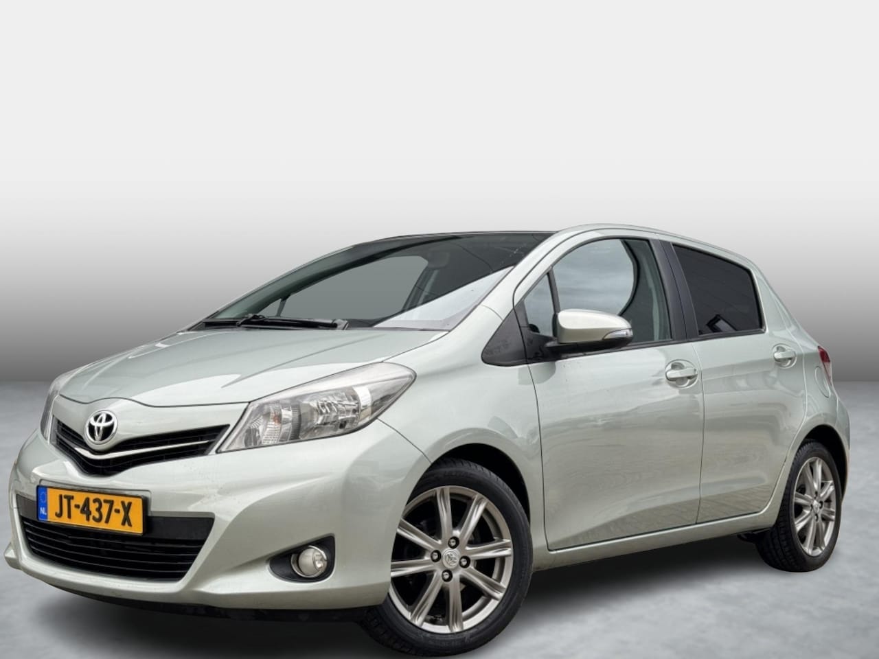 Toyota Yaris - 1.3 VVT-i Dynamic Panoramadak Navi Airco Camera - AutoWereld.nl