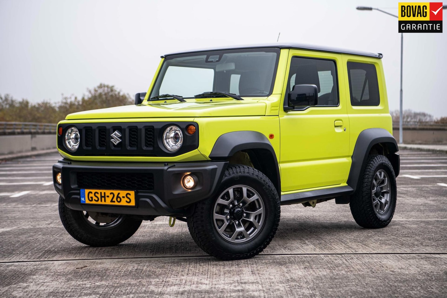 Suzuki Jimny - 1.5 Stijl | Airco/Clima | Cruise Control | Navigatie | Stoelverwarming | Trekhaak | - AutoWereld.nl