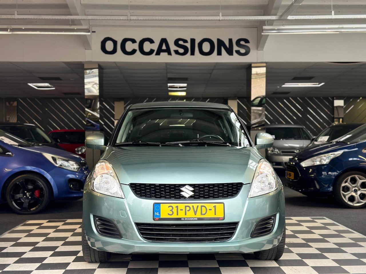 Suzuki Swift - 1.2 Airco Stoelverwarming Cruise 16'' 5DRS - AutoWereld.nl