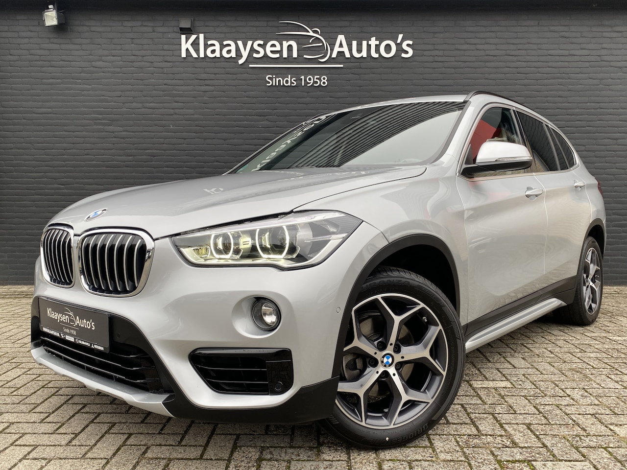 BMW X1 - sDrive18i 140 pk Executive Edition AUT. | 1e eigenaar | navigatie | bruin leder interieur - AutoWereld.nl