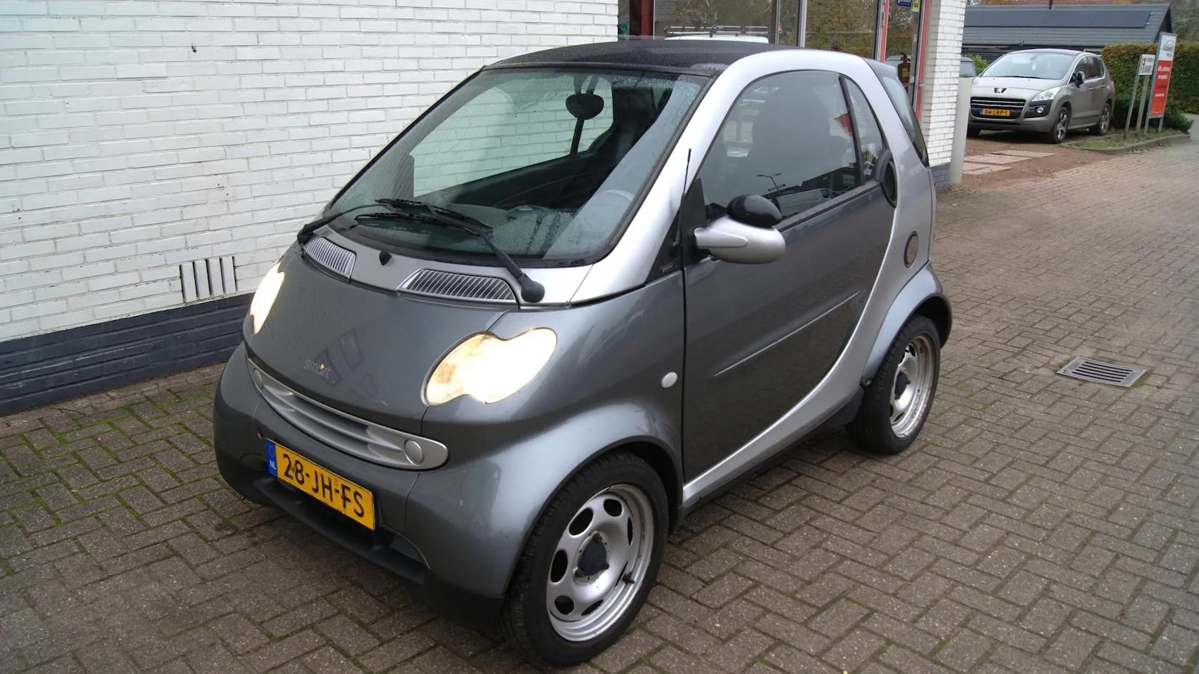 Smart City-coupé - MICRO COMPACT CAR smart & passion panodak/airco/leer/NAP - AutoWereld.nl