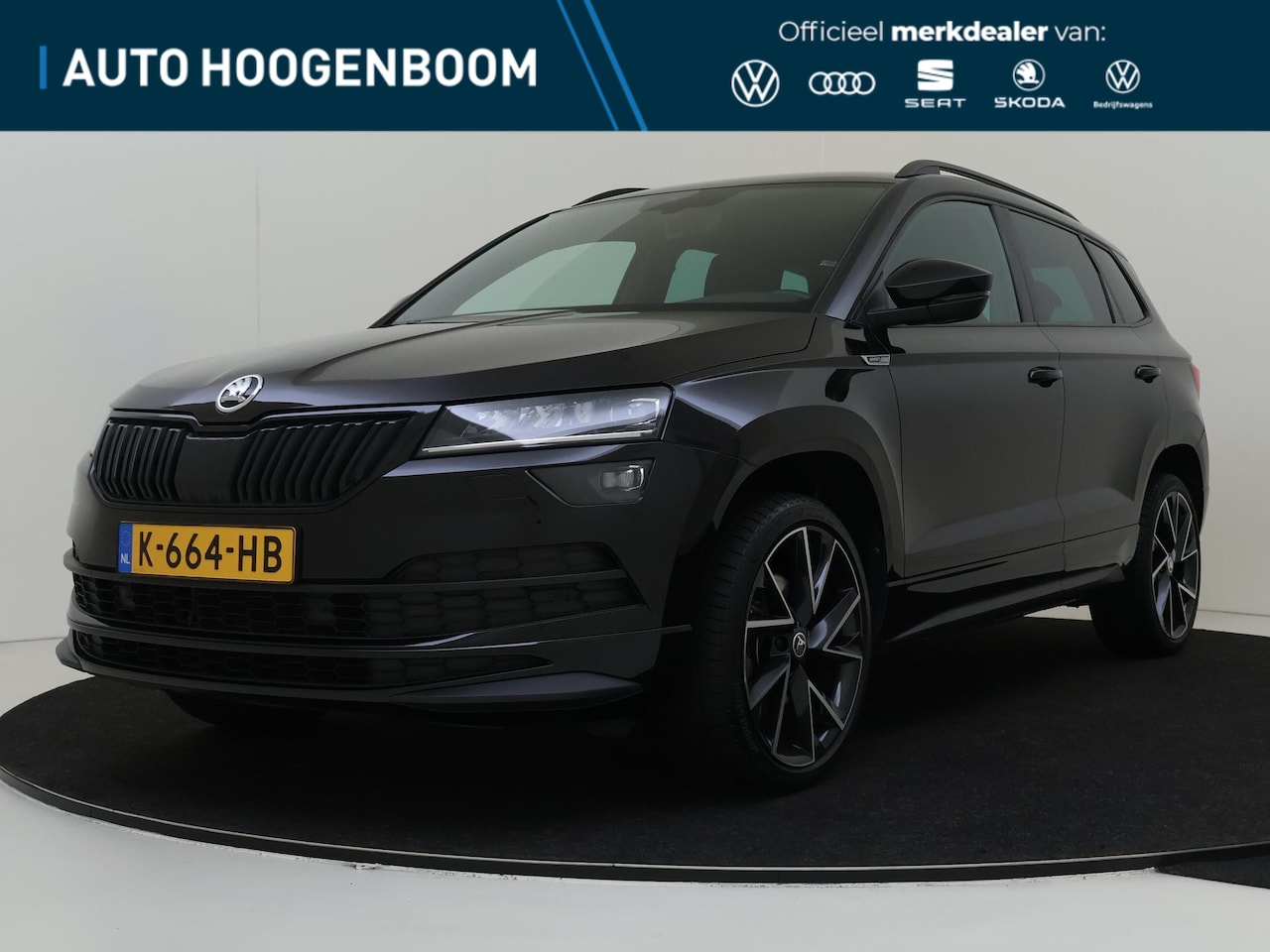 Skoda Karoq - 1.5 TSI ACT Sportline Business | Trekhaak | Achteruitrijcamera | Stoel- en stuurwielverwar - AutoWereld.nl