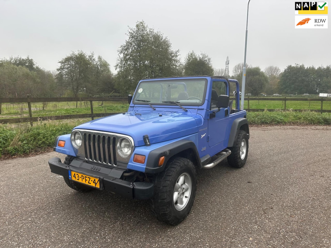 Jeep Wrangler - 2.5i Softtop Hardtop 4X4 Benzine Airco - AutoWereld.nl