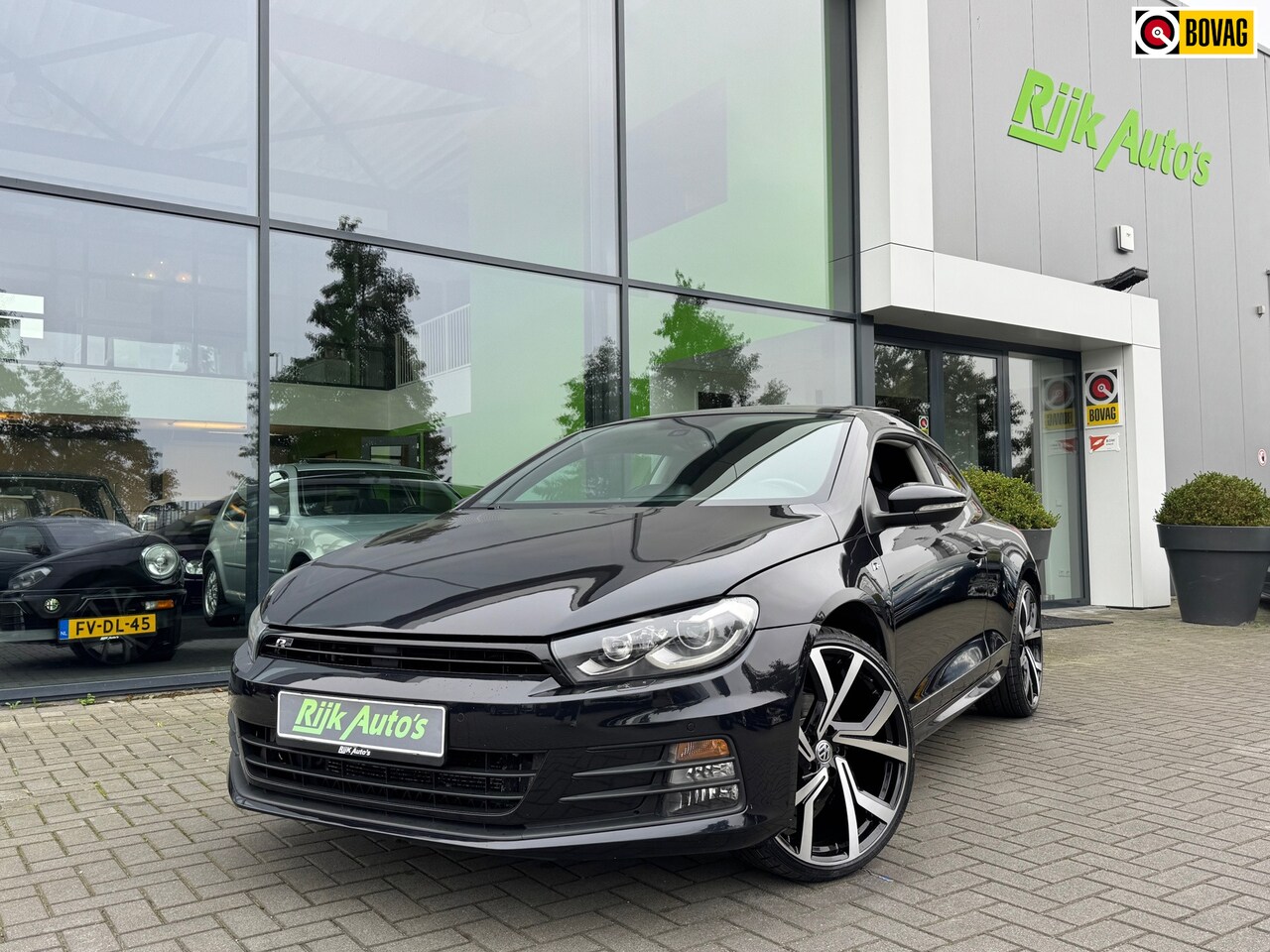 Volkswagen Scirocco - 1.4 TSI Highline * Panoramadak * Xenon * Cruise Control - AutoWereld.nl